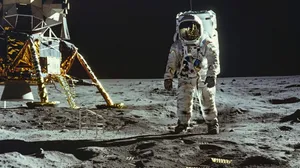 Astronaut Near Lunar Module On Moon Wallpaper