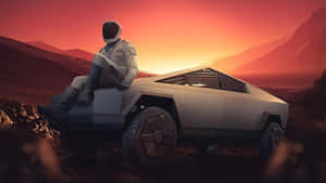 Astronaut_ Sitting_on_ Futuristic_ Car_ Mars_ Sunset Wallpaper