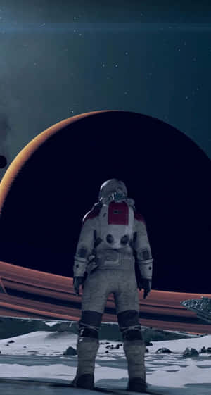 Astronaut Standing Before Gas Giant Wallpaper