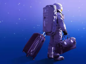 Astronaut Travelerwith Purple Suitcase Wallpaper
