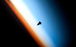 Astronauts Exploring A New Frontier In Space Wallpaper