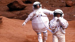 Astronauts_on_ Martian_ Terrain_ Simulation Wallpaper