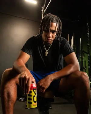 Athlete Contemplation During Workout Wallpaper