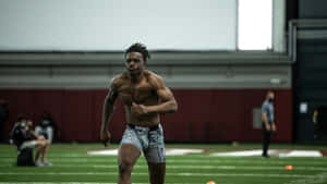 Athlete Running Drill Indoor Training Facility.jpg Wallpaper