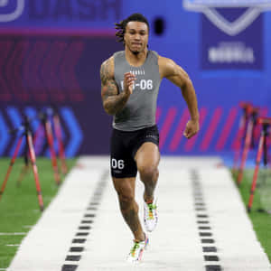 Athlete Running40 Yard Dash Wallpaper