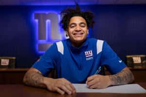 Athlete Signing Contractwith N Y Giants Wallpaper