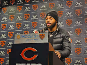 Athlete Speakingat Chicago Bears Press Conference Wallpaper