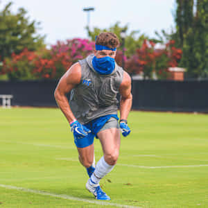 Athlete Training Intensity Outdoors Wallpaper