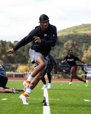 Athlete Training Session Outdoors.jpg Wallpaper