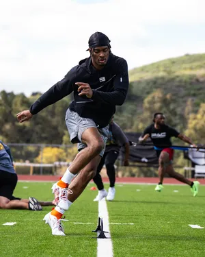 Athlete Training Session Outdoors.jpg Wallpaper