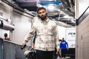 Athlete Walking Through Tunnel Wallpaper