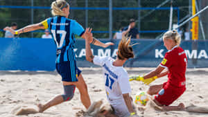 Athletes Playing Beach Soccer At Sunset Wallpaper