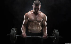 Athletic Man With Barbell Wallpaper