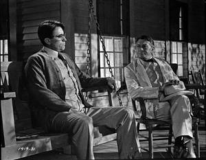 Atticus Finch And Judge Taylor In A Crucial Scene From The Classic 'to Kill A Mockingbird' Wallpaper