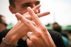 Attitude Boy With Peace Sign Wallpaper