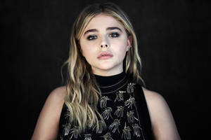 Attractive Chloë Grace Moretz On Black Wallpaper