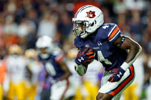 Auburn Football Player Action Shot Wallpaper