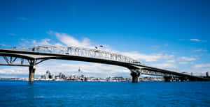 Auckland Harbour Bridgewith City Skyline Wallpaper