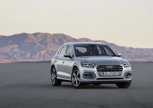 Audi Q5 - Driving On Open Road In Style Wallpaper