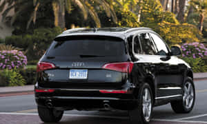 Audi Q5 Luxury Suv On Open Road Wallpaper