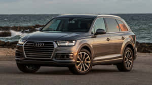 Audi Q7 Luxury Suv On A Scenic Drive Wallpaper