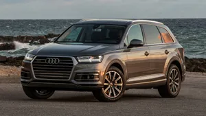 Audi Q7 Luxury Suv On A Scenic Drive Wallpaper