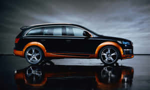 Audi Q7 Premium Suv In Stunning Landscape Wallpaper