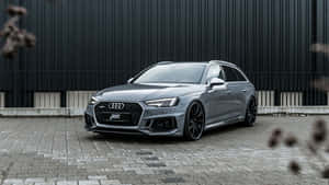 Audi Rs5 Sport Coupe In Action Wallpaper