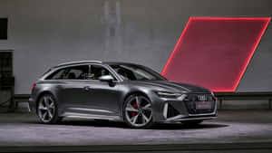 Audi Rs6 Avant Roaring On The Road Wallpaper