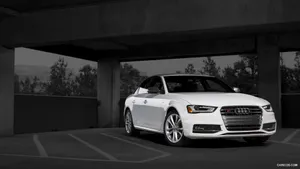 Audi S4 In Motion: Power And Luxury On Display Wallpaper