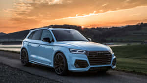 Audi Sq5 Cruising On The Highway Wallpaper