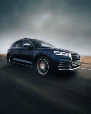 Audi Sq5 In Motion On The Road Wallpaper