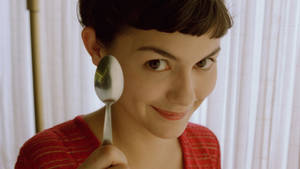 Audrey Tatou Holding Spoon Wallpaper