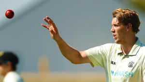 Australian Cricket Sensation Cameron Green Playing A Fierce Shot. Wallpaper