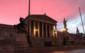 Austrian Parliament Buildings In A Beautiful Pinkish Sky Wallpaper