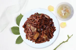 Authentic Dark Hokkien Mee On A White Plate Wallpaper
