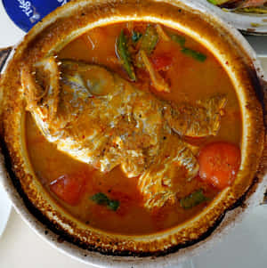 Authentic Fish Head Curry In Clay Pot Wallpaper