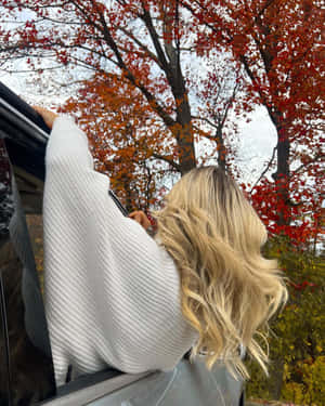 Autumn Vibes Woman And Fall Foliage.jpg Wallpaper