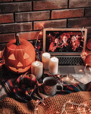 Autumnal Cozy Workspace Halloween Vibes Wallpaper