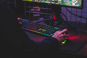 Avid Gamer In Action Wallpaper