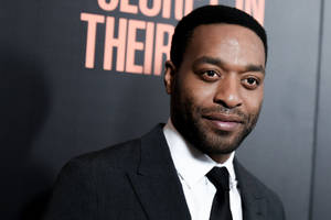 Award-winning Actor Chiwetel Ejiofor In A Movie Scene Wallpaper