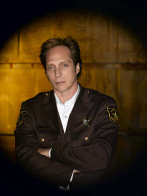 Award-winning Actor William Fichtner Against A Dark Background. Wallpaper