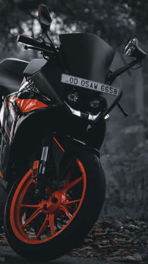 Awe-dropping Shot Of A Ktm Dirt Bike In Action Wallpaper