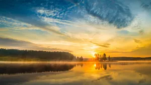 Awe-inspiring Mountain Range At Sunrise Wallpaper