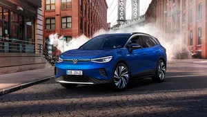 Awe-inspiring Volkswagen Id.4 Charging In The Night Wallpaper