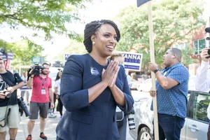 Ayanna Pressley Engaging With Public Business Outside Wallpaper