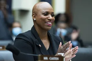 Ayanna Pressley Happily Clapping Hands Wallpaper