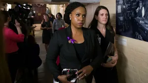 Ayanna Pressley Walking With Staff Members Wallpaper