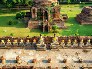Ayutthaya Buddha Statues Row Ancient Temple Wallpaper