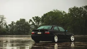 B M W E36 Coupe Rainy Reflection Wallpaper